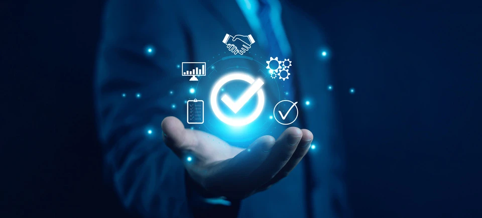 Hand shows a checkmark - symbolizing compliance