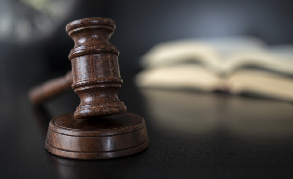 justice and law concept over black wooden desk