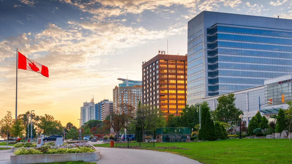 Windsor, Ontario, Canada skyline on the Detroit River at dawn